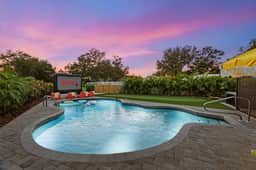 Backyard Paradise • Sleeps 14 • Arcade Games • Spa