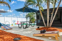 7 Min to Beach ~ Pool, BBQ & Games Getaway