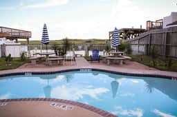 Cozy Canal Retreat Pool, Fishing, & Close to Beach