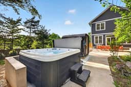 Outdoor Games • Hot Tub • Firepit • Grill • Sauna