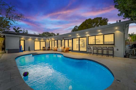 Resort Style Backyard~Heated Pool~Hot Tub~Fire Pit - Image 1