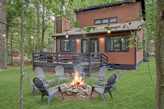 3BR Home w/ Outdoor Fun: Lake~Fire Pit~Games~Grill - Image 1