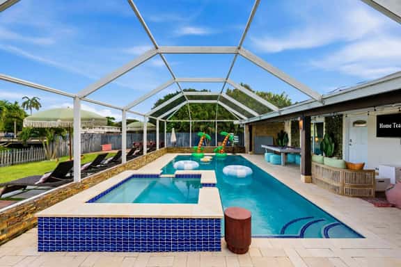 Mins to Beach • Backyard Oasis • Heated Pool & Spa - Image 1