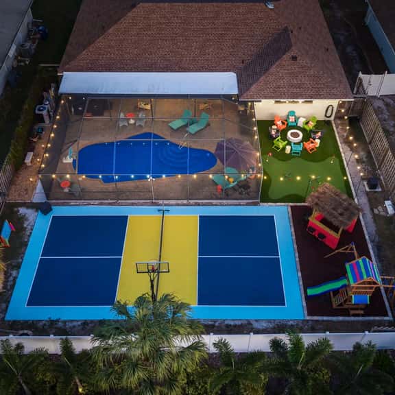 Sleeps 14 • Sport Court • Tiki Bar • Heated Pool - Image 1