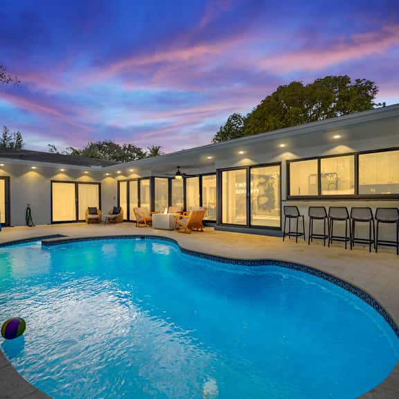 Resort Style Backyard~Heated Pool~Hot Tub~Fire Pit - Image 1