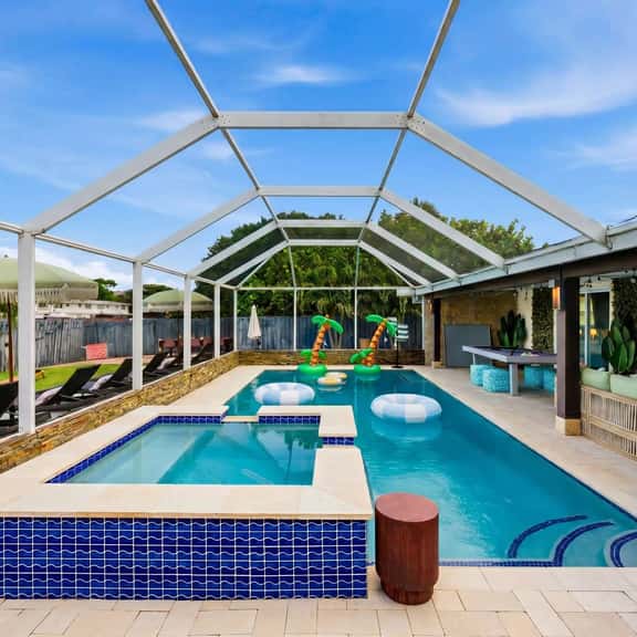 Mins to Beach • Backyard Oasis • Heated Pool & Spa - Image 1