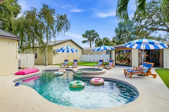 Sleeps 14 • Heated Pool • Spa • Arcade • Putt Putt