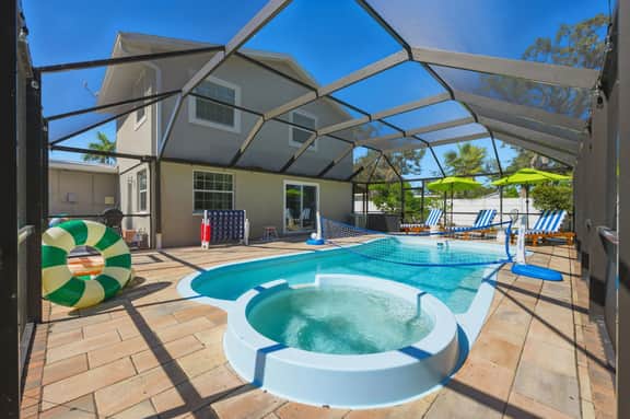 Sleeps 16 • Golf Simulator • Pickleball • Pool/Spa