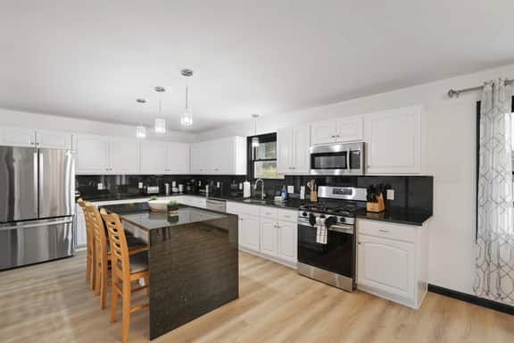 Sleeps 14 • Hot Tub • Sauna • Game Room • Fire Pit