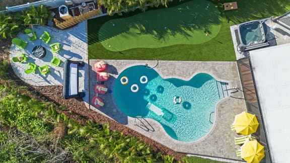 Backyard Paradise • Sleeps 14 • Arcade Games • Spa