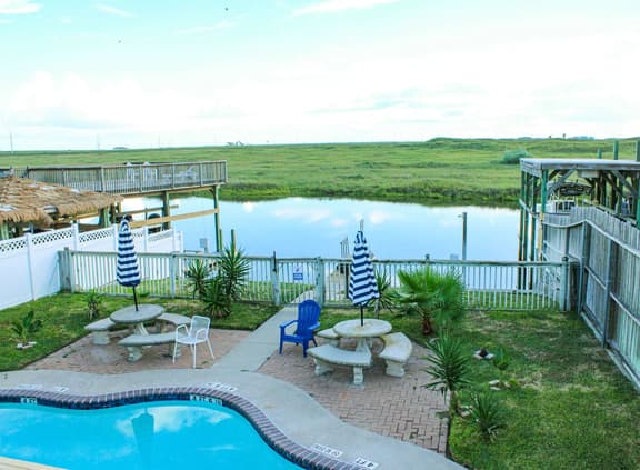 Cozy Canal Retreat Pool, Fishing, & Close to Beach
